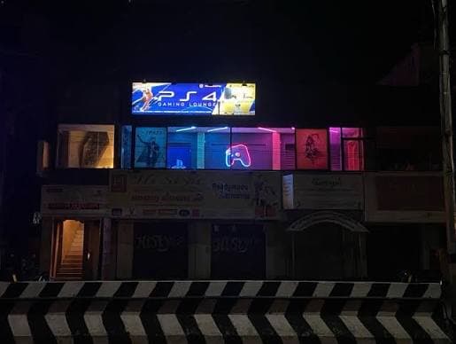 PS4 Gaming Lounge exterior at night